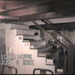 54-Surveillance photo 1 - No one is home in this locked active house but a shadow appears to left of staircase in any event